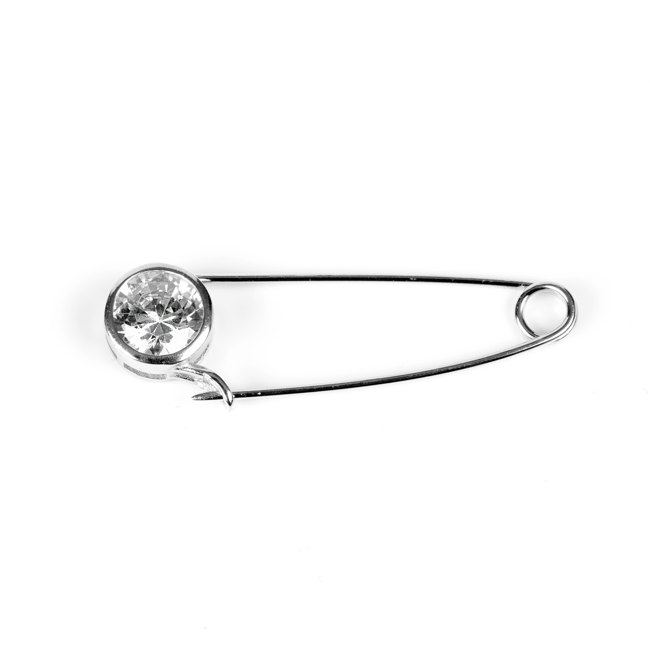 Silver brooch with zircons